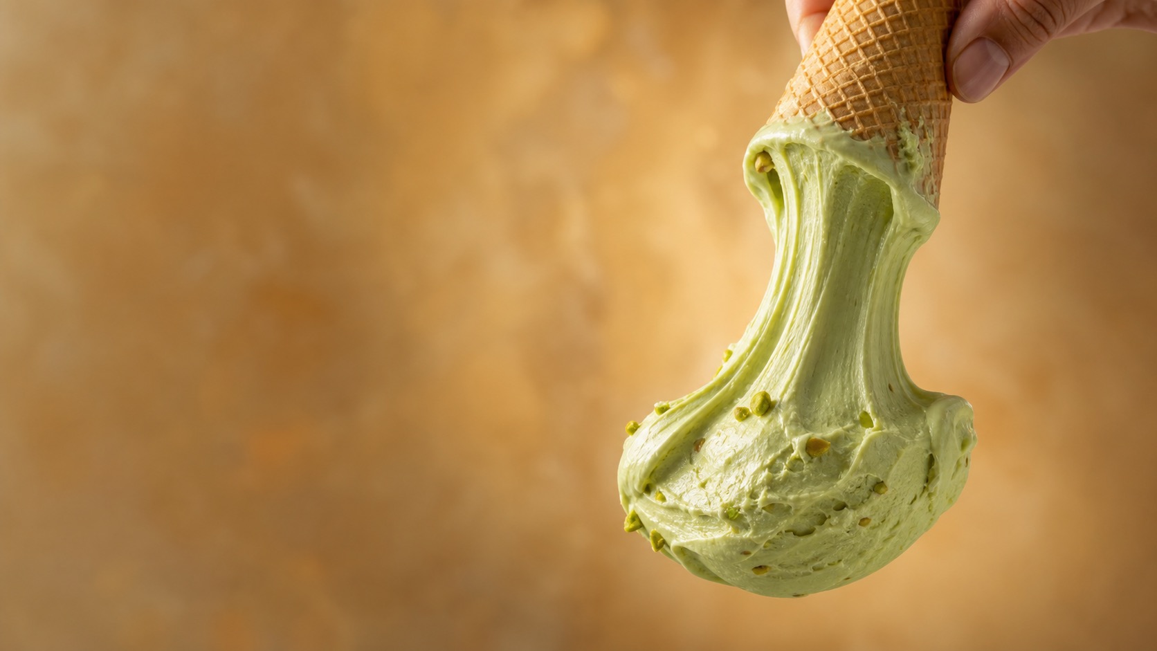 A stretched scoop of Turkish dondurma ice cream for the Maraş brand
